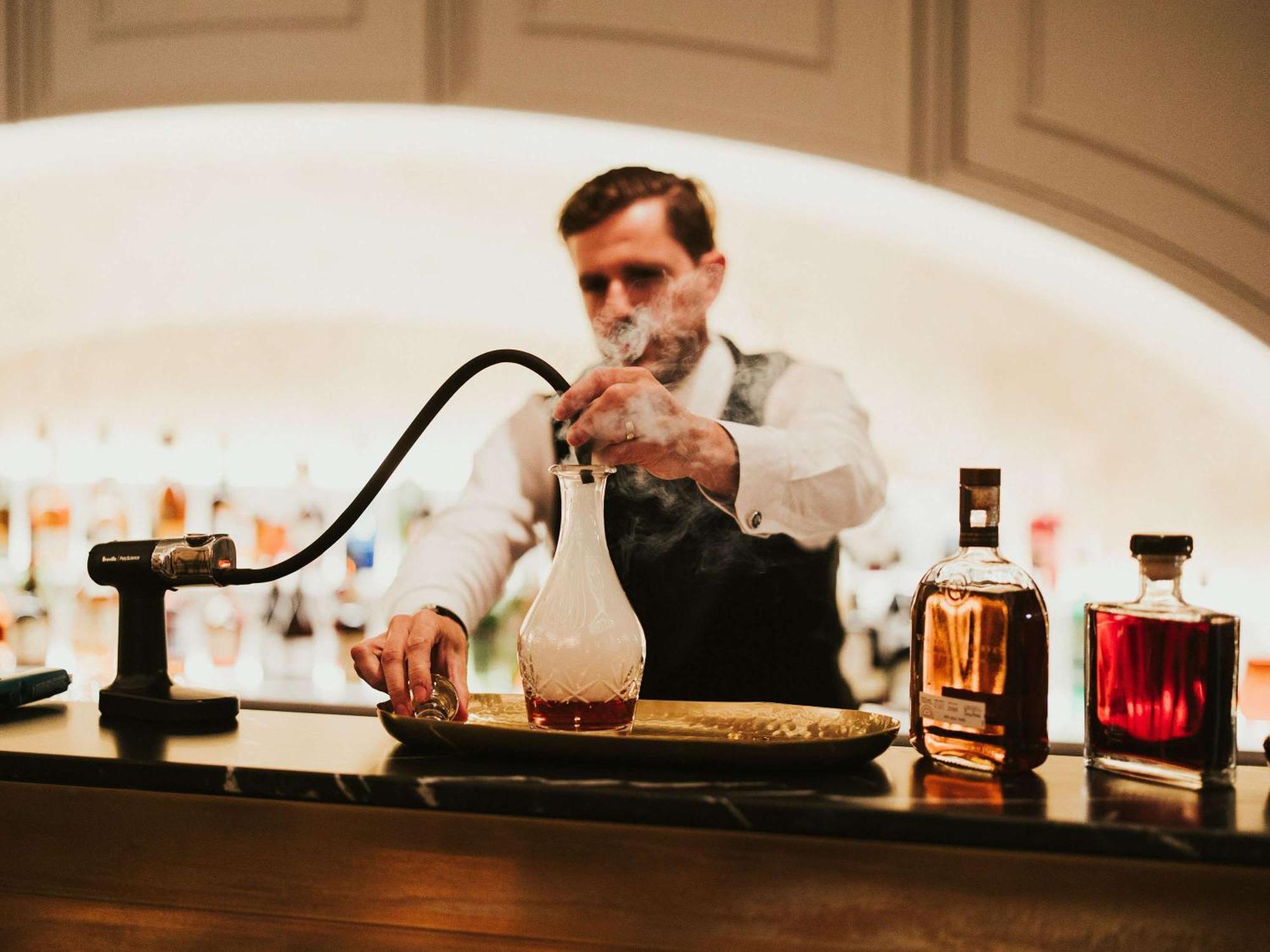 The Playford Adelaide - Mgallery Exterior foto A bartender at work